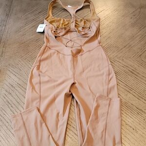Free people NWT size small blush jumpsuit